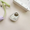 Macro detail of resin phone grip with seashell pearl and gemstone in ocean style - Adhesive Stand Cat-Eye Shell (Grey)