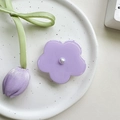 Macro detail of lavender flower phone grip with a glossy faux pearl center on white plate - Transparent Stand / Pearl Purple Flower