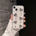 Dettaglio di ciondoli a cuore argento e cristalli rosa sulla cover di lusso per iPhone - Colla glitterata bianca-5 cuori di diamanti rosa / iPhone 7/8/SE 2020