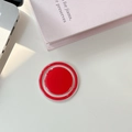 Vue détaillée du support magnétique circulaire rouge pour téléphone avec cadre clair - Rouge Magnétique