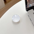 Minimalist white round crystal glass cell phone socket grip on a clean office desk - White Stand / White