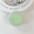 Detailed view of green apple fruit grip for phone with transparent round housing - (Dopamine) Magnetic-Sandwich Apple-Fruit Green