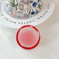 Dettaglio del supporto per telefono rosa a forma di mela su un piatto decorativo - (Dopamina) Magnetico-Sandwich Mela-Rosso