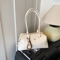 Cream vintage bowling handbag with COIN logo and baseball charm on a book - White With Pendant