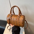Brown Boston bag featuring vintage cartoon bear pattern and adjustable shoulder strap - Brown