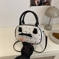 Bolso bowling plisado blanco crema con bordado de lazos negros y bandolera - Rosa