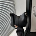 Chic black matte leather bucket bag with gold 'Fashion' lettering and adjustable strap - Black