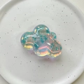 Detailed view of iridescent laser cloud phone stand with colorful rainbow crystal finish - Cloud / Blue