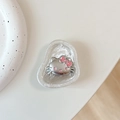 Λεπτομέρεια βάσης Hello Kitty με ασημί γκλίτερ και ροζ φιόγκο για κινητά - Στυλ Υφής Αλουμινίου 1