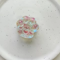 Close-up of an iridescent holographic cat paw phone grip with a heart relief detail - Cat Claw (Glossy) / Holographic Multicolor