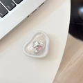 Close-up of heart-shaped phone grip with pink gemstone on a white desk background - Irregular Ring Stand-Tin Foil Texture-No. 25