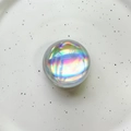 Detailed view of an iridescent laser crystal ball phone holder with vibrant rainbow shimmer - Crystal Ball / Silver Laser