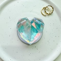 Close-up of heart-shaped holographic crystal phone grip with multi-faceted resin design - Magnetic Geometric Large Heart - Blue Light