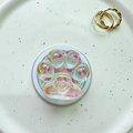 Detail of a cat paw shaped magnetic phone socket with iridescent laser resin and heart detail - Magnetic Cat Paw - Colorful Laser