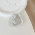 Dettaglio del supporto per telefono a cuore in metallo liquido con cristalli luccicanti - Texture in Alluminio #15