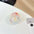 Macro view of a 3D spherical resin phone grip featuring starfish, koi, and shell decor - Star Conch Goldfish Style (Blue Light No. 1)