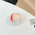 Macro shot of circular resin phone grip featuring a red fish, starfish, and pearl inside - Star Pearl Red Fish Style (Blue Light No. 2)