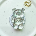 Macro detail of transparent bear phone grip featuring internal silver brushed texture - Magnetic Bear - Water Ripple