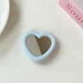 Close-up of light blue heart-shaped phone grip with built-in mirror and silicone frame - Light Blue