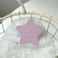 Macro detail of purple leather star phone grip with Smile embossing on soft plush surface - Purple (Transparent Stand - Leather Pentagram)