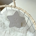 Detail of gray star-shaped leather phone socket with smile engraving and stitching - Silver (Transparent Stand - Leather Pentagram)