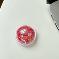 Dettaglio del supporto rotondo per telefono con paillettes a cuore rosse lucide - Rosso