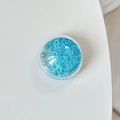 Macro shot of light blue holographic round sequins for DIY craft and nail art decoration - Colorful Sequins-Blue