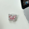 Detailansicht der Schmetterling Handyhalterung mit rosa Kristallen und Metall - Transparenter Sternenhimmel Schmetterling - Rosa