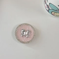 Dettaglio del supporto per telefono rosa con farfalla d'argento e strass brillanti - Supporto Trasparente-Strass Perla-Farfalla Cicciottella-Rosa