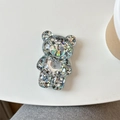 Dettaglio del supporto per telefono a forma di orso glitterato con cuore d'argento - Supporto per Airbag Orso / Nero
