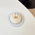 Detalle macro de soporte para móvil de concha 3D con base de purpurina y metal - Magnético Brillo Etiqueta Dorada Concha - Albaricoque