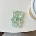 Détail du support téléphone ours à paillettes vert clair avec miroir en forme de cœur - Vert
