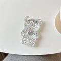 Détail du support de téléphone ours transparent avec paillettes argentées et cœur - Argent
