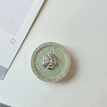Detail of floral rhinestones and silver camellia design on phone collapsible socket - Transparent Airbag Stand (Silver Camellia) / Green