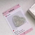 Gros plan d'un support de téléphone cœur à paillettes avec des sequins étincelants - Support Coeur Époxy Paillettes - Point - Vert Fantôme