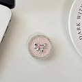 Dettaglio del supporto cellulare in pelle rosa con fiocco argento e strass - Rosa