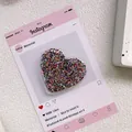 Gros plan du support de téléphone en forme de cœur avec paillettes colorées et sequins - Support Coeur Époxy Paillettes - Point - Couleur Mixte