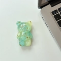 Detail of transparent bear phone grip with gold foil inlay and green gradient finish - Gradient Green