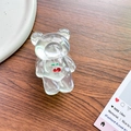 Close-up of transparent acrylic bear phone grip with red cherry pattern on wooden desk - Bear Stand - Rhinestone Cherry - Water Ripple