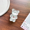Detail of transparent bear phone grip with cherry pattern on a wooden surface - Bear Stand - Rhinestone Cherry - Tin Foil Texture