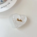 Detail of glittery heart-shaped phone grip in pearly white with gold Smile lettering - Large Heart Grip-Cloud Gold Smile-White