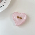 Close-up of glitter pink heart phone grip featuring a gold metallic Smile lettering - Large Heart Grip-Cloud Gold Smile-Pink