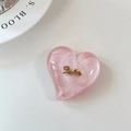Gros plan du support de téléphone cœur pailleté rose avec emblème Smile doré - Grande Poignée de Coeur-Sourire d'Or de Nuage-Rouge