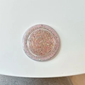 Close-up of a round MagSafe phone grip with colorful holographic glitter and sequins - Magnetic - Glitter Epoxy - Brown