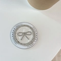 Supporto per telefono con fiocco di strass e design Gift For You su tavolo bianco - Bianco