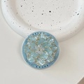 Detail of blue floral pop socket with gold edges and crystal center on ceramic tray - Gold Lake Blue Shell Flower (Blue Base)
