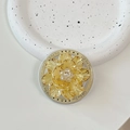 Gouden bloem telefoonhouder met kristal op decoratief dienblad in close-up opname - Goudgeel Schelpbloem (Gele Basis)