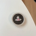 Detail einer glitzernden Planeten-Handyhalterung mit Straß und pinkem Planeten-Logo - Rosa Strass Planet - Schwarz
