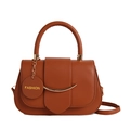 Chic brown saddle bag in premium PU leather with golden metal trim and top handle - Brown