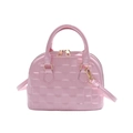 Pink shell handbag with embossed grid pattern and gold hardware on white background - Pink